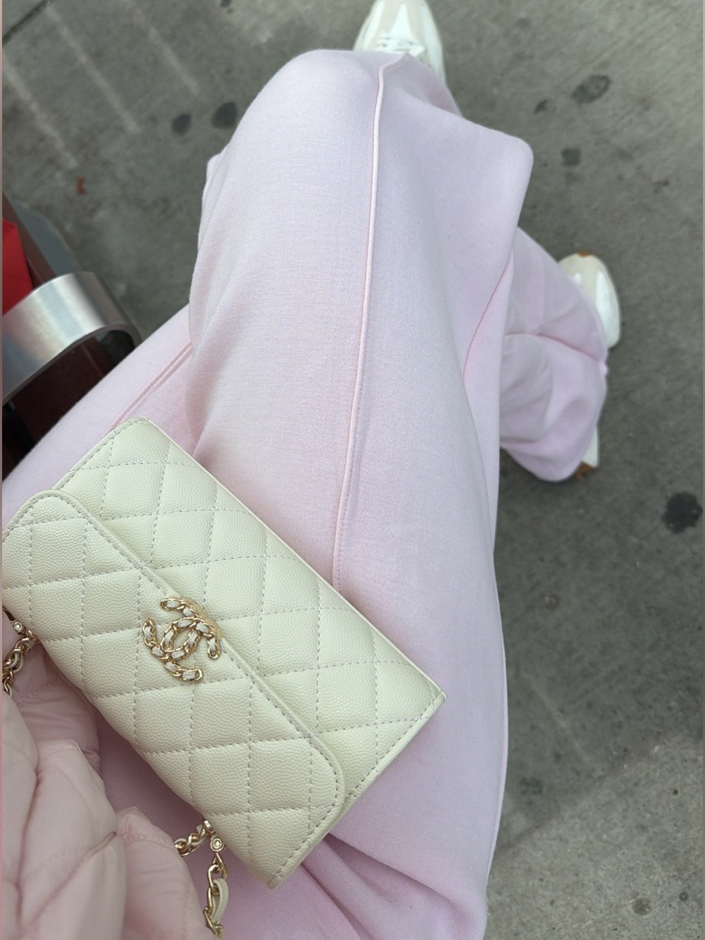 Cream Quilted Wallet on Chain with Pale Pink Outfit Accent